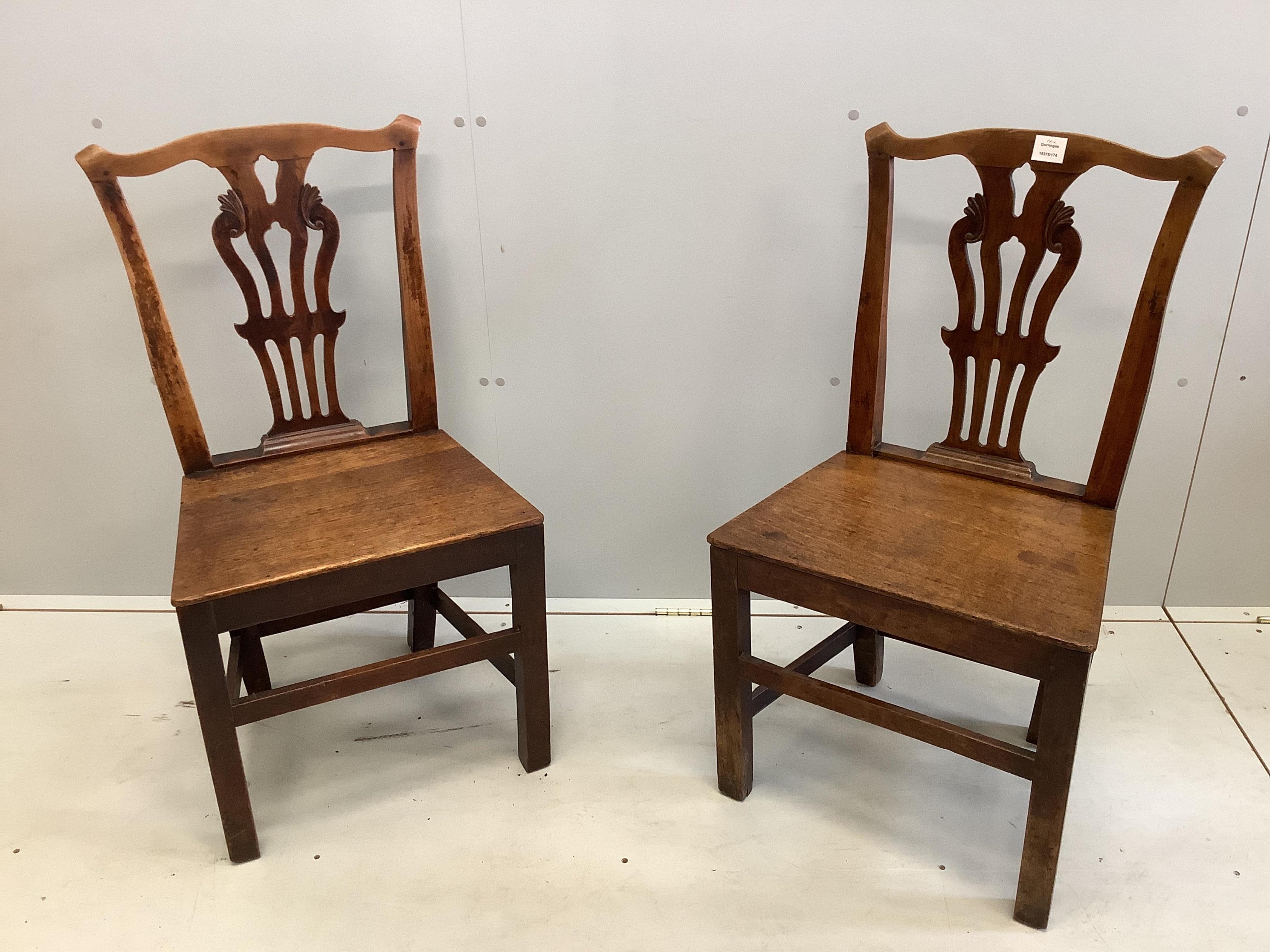 A pair of Chippendale style mahogany dining chairs, height 91cm. Condition - fair